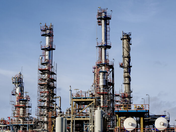 Modern factory in an industrial zone under a blue sky